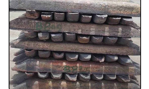 Cast copper ingots stacked on a pallet